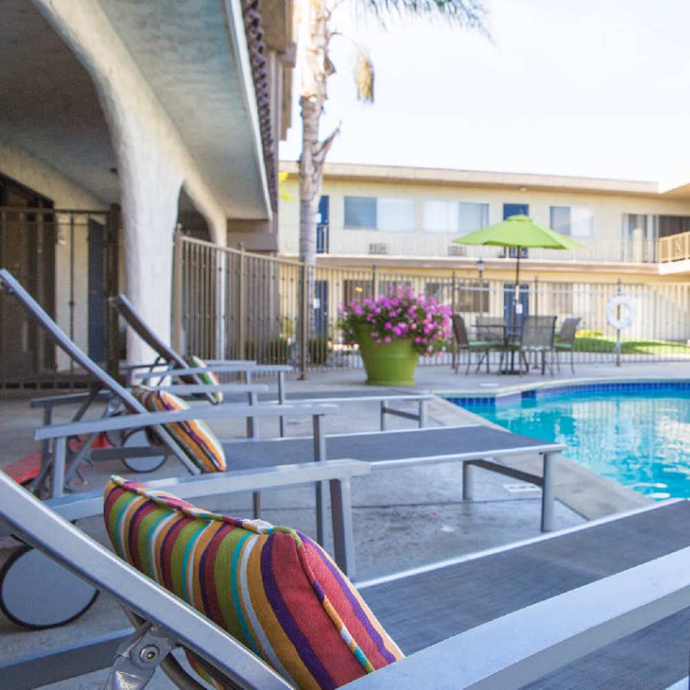Swimming pool with lounge beds at Park Terrace in Reseda, California,