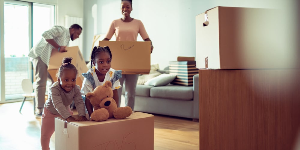 a family packing up some things for storage at Trojan Storage of North Sacramento in Sacramento, California