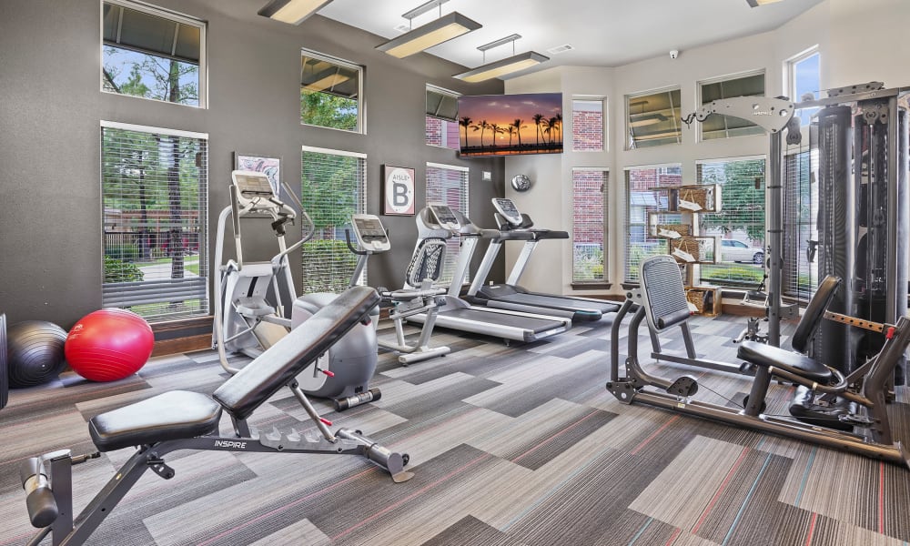 Gym with gray carpet at Icon at Broken Arrow in Broken Arrow, Oklahoma