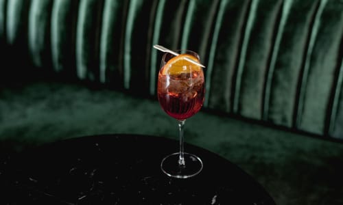 A cocktail on a table at a restaurant near Lincoln Landing in Hayward, California