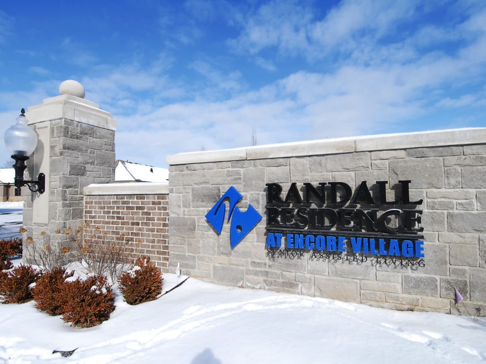 Entrance sign at Randall Residence at Encore Village in Brighton, Michigan