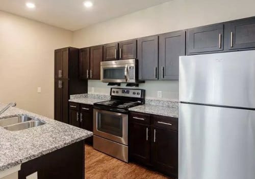 Bright, modern kitchen at Canal Crossing in Camillus, New York