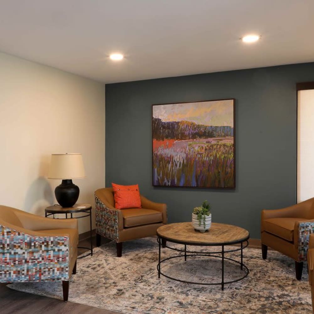 Living room with modern furnishings at Sunny Garden Apartments in La Puente, California