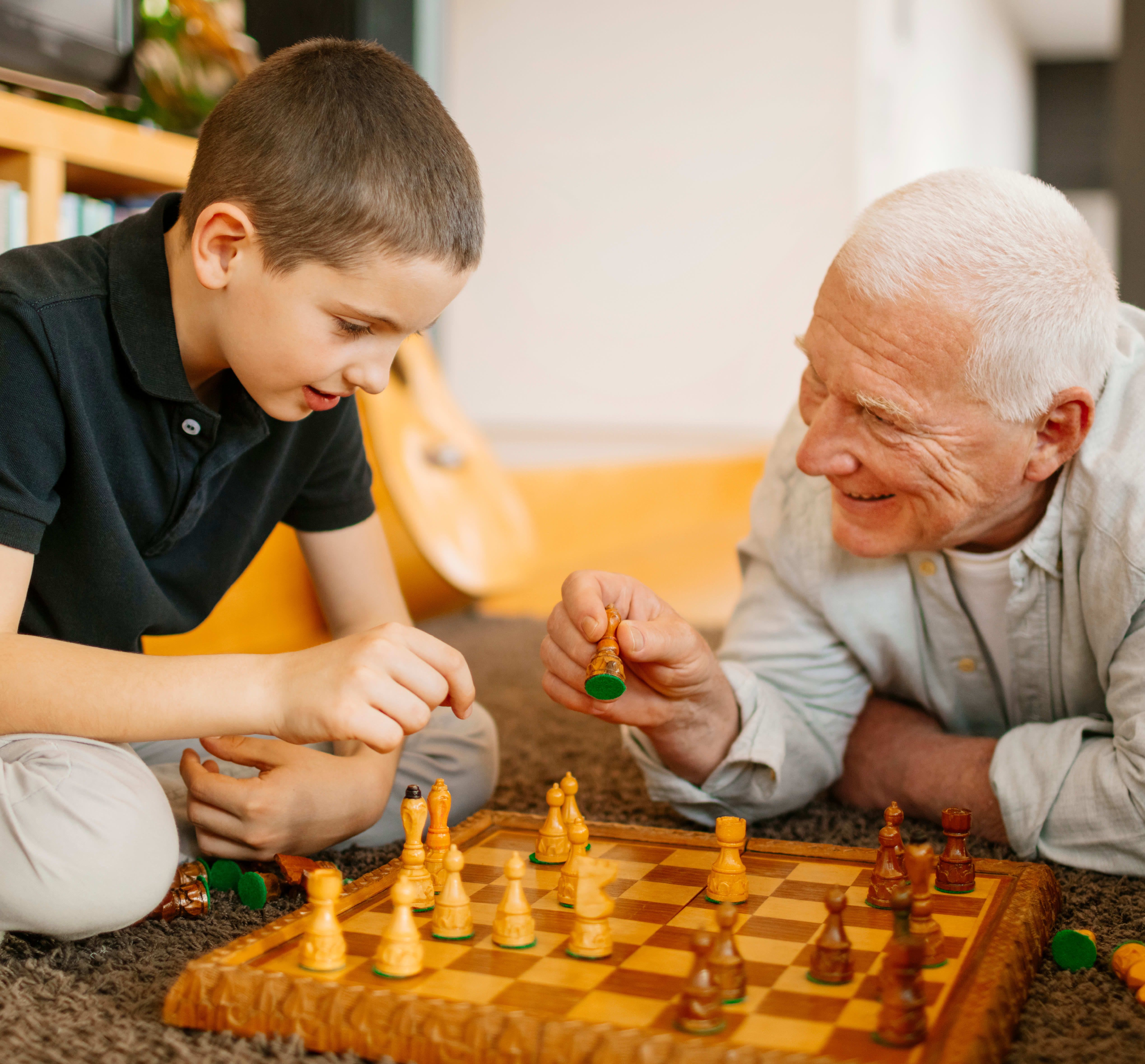 Seniors playing chess at The Charleston at Cedar Hills in Cedar Hills, Utah