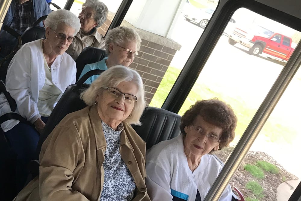 Residents take a bus ride to town at Prairie Hills Independence in Independence, Iowa.