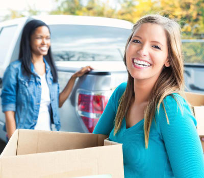 People arriving with moving boxes at Jacksonville Mini Warehouse in Jacksonville, North Carolina