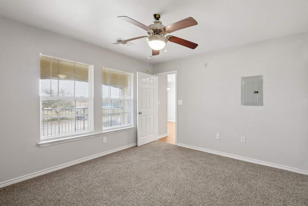 Bedroom with large windows at Horizon Meadows in La Marque,Texas