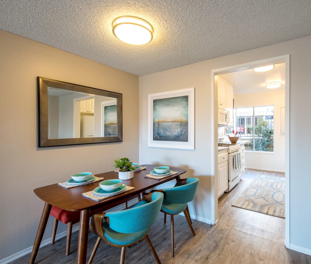 Partial view of the kitchen from a model home's dining area at Sofi Thousand Oaks in Thousand Oaks, California
