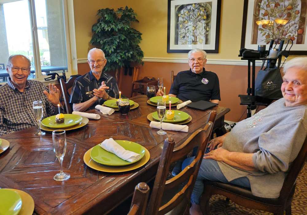 Residents sitting down for a fancy meal at The Pines, A Merrill Gardens Community in Rocklin, California