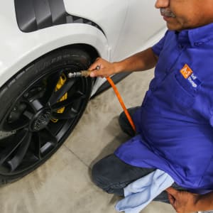 An A-1 Car Storage - San Diego technician maintains proper tire pressure