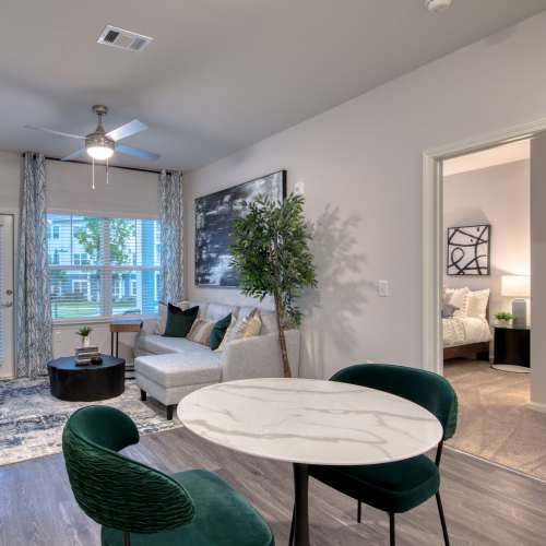 Living room with dining area at The Mason in Augusta, Georgia