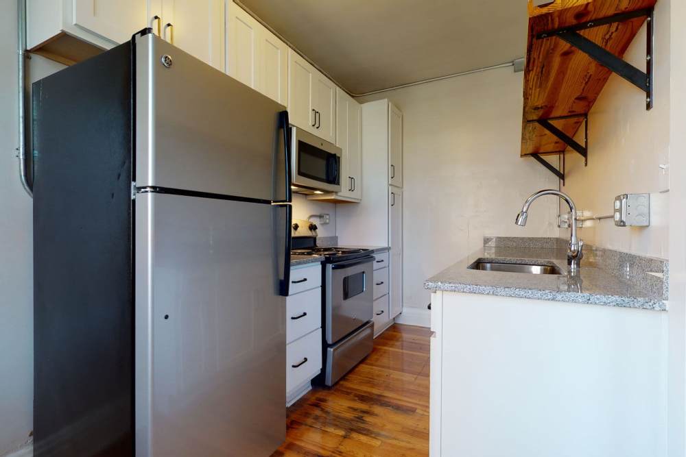 Kitchen with appliances at Historic Boylan Apartments in Raleigh, North Carolina