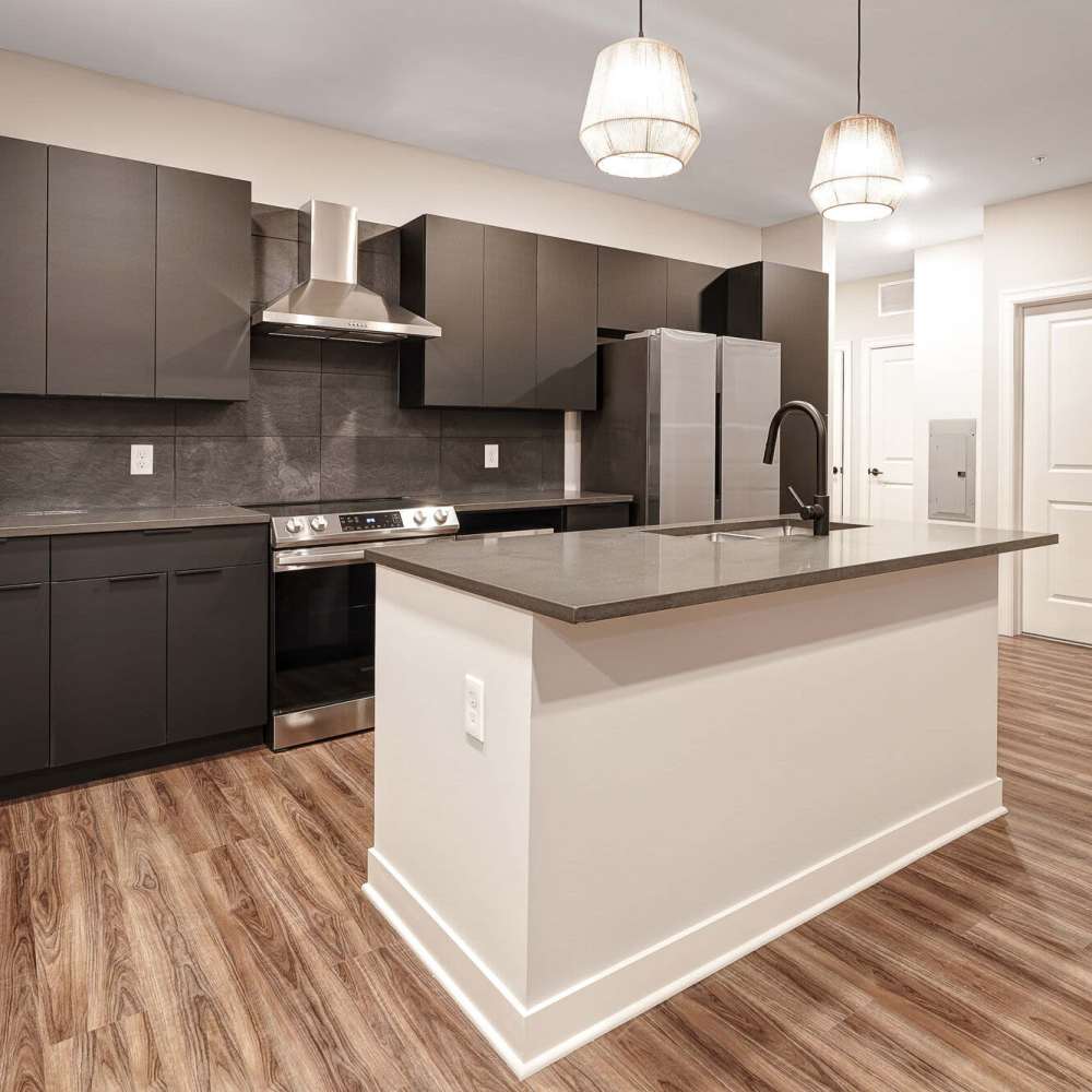 Kitchen with granite counter top at Green|House Short North in Columbus Ohio