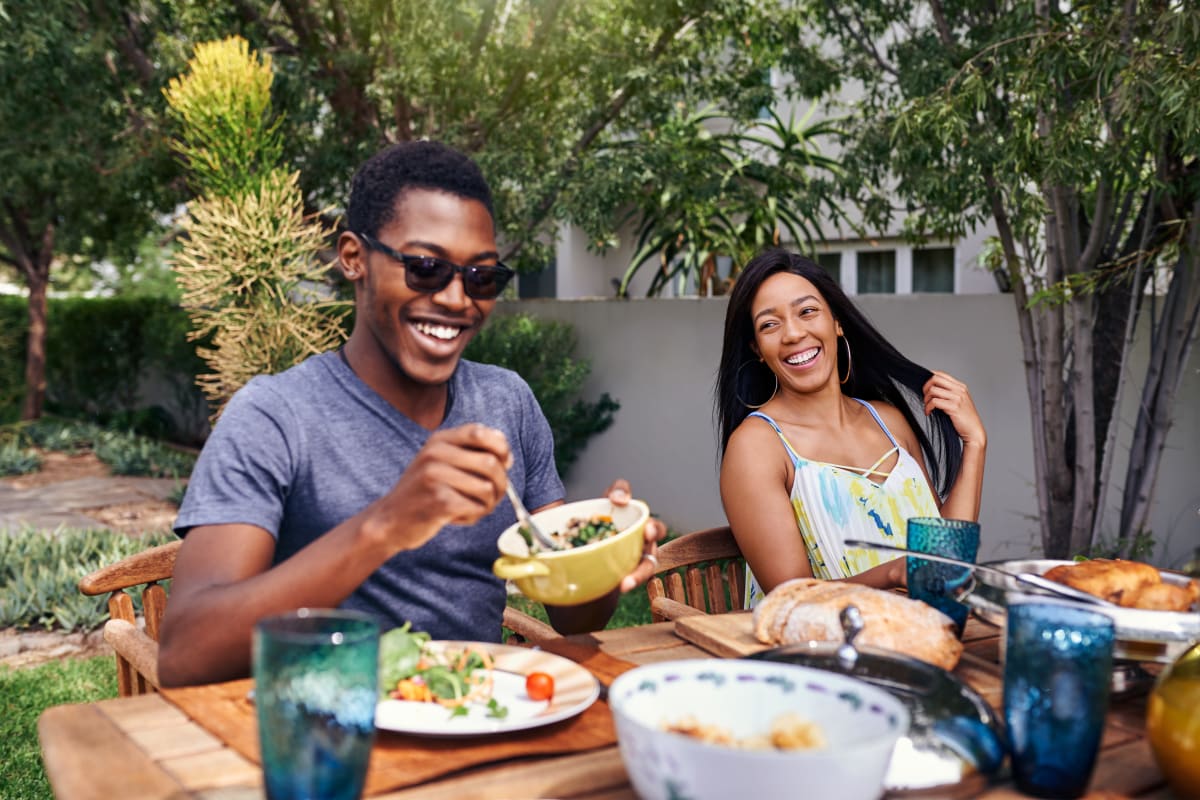 Residents having dinner outside in Duluth, Georgia from Marquis at Sugarloaf