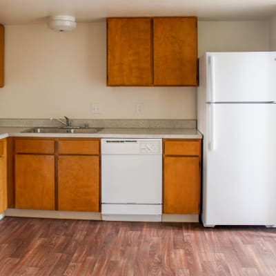 Wood flooring in a kitchen at Miramar Townhomes in San Diego, California