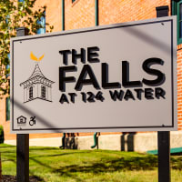 Welcoming sign at The Falls at 124 Water in Leominster, Massachusetts