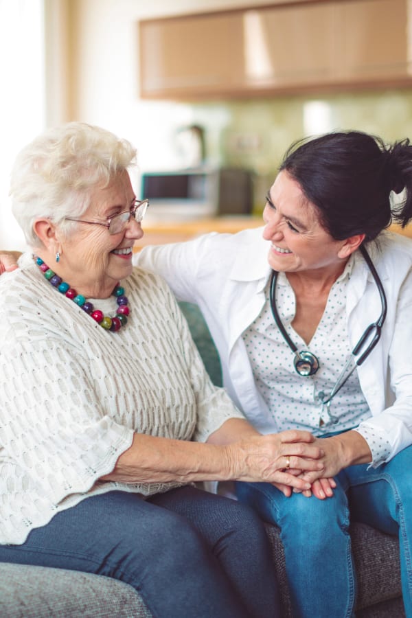 Resident and caretaker talking at Living Care Lifestyles in Seattle, Washington