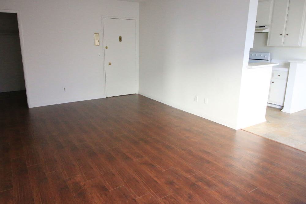 Spacious bedroom with wood-style flooring at Regency in Sherman Oaks,California