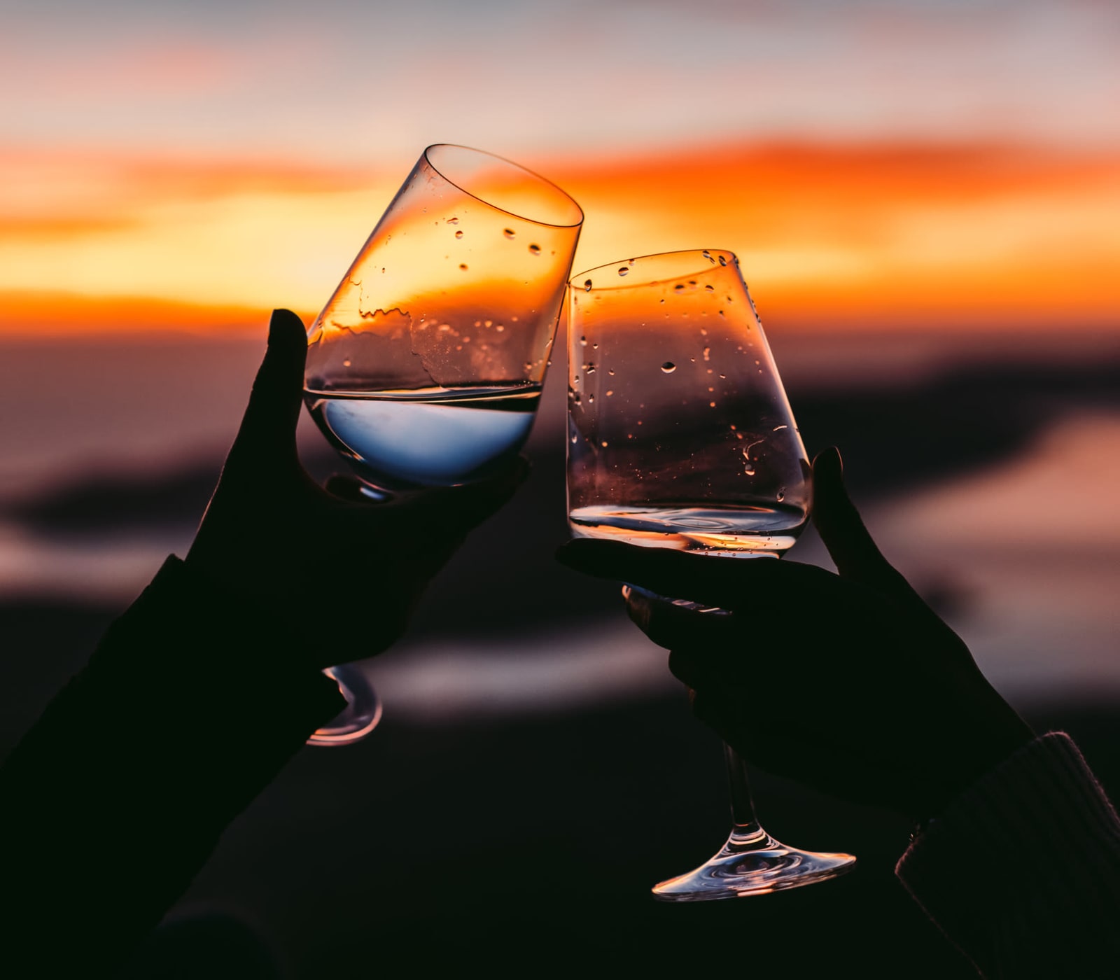 Residents drinking wine and looking out at the ocean near Nine20 Manatee in Bradenton, Florida