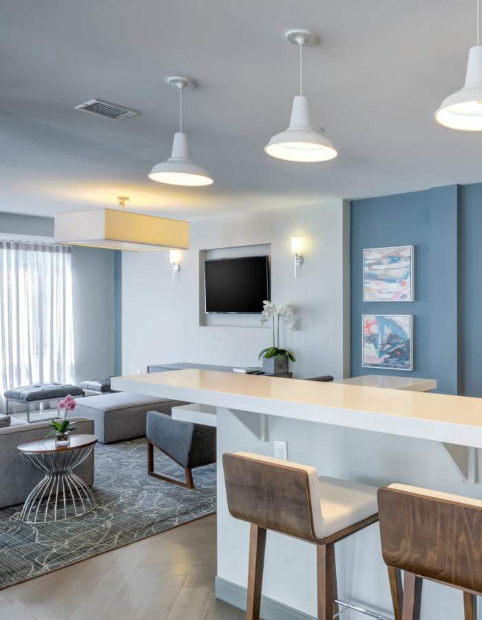 Open concept kitchen in modern apartment at Crossings at Olde Towne in Gaithersburg, Maryland