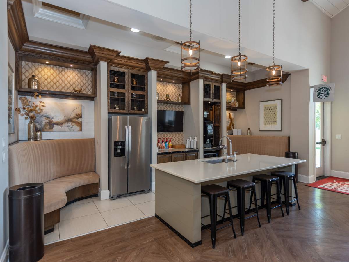Clubhouse Kitchen Island with Sink at Red Knot at Edinburgh in Chesapeake, Virginia.