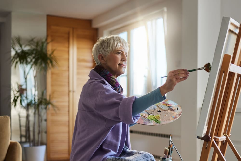 Resident painting at Regency Pullman in Pullman, Washington