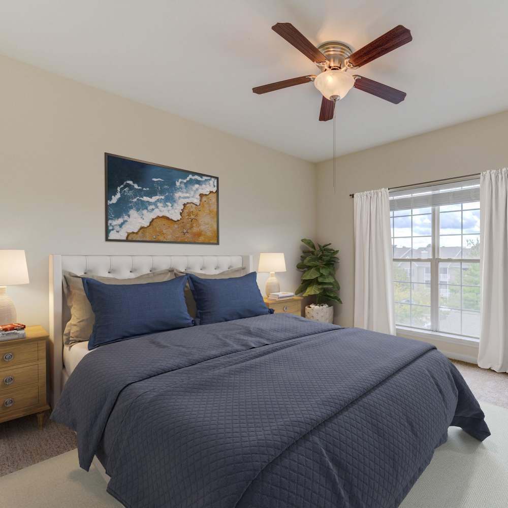 Charming bedroom with elegant decor and natural light at Boulder Springs in Maryland Heights, Missouri.