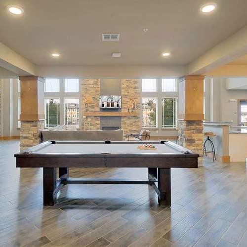 Pool table in clubhouse at Caliber at Hyland Village in Westminster, Colorado