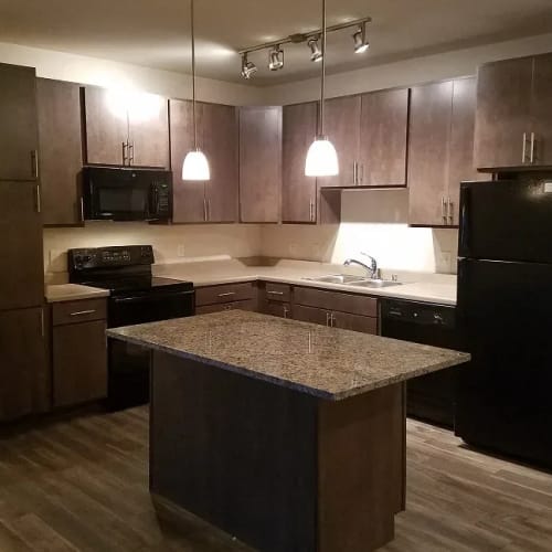 Well-equipped kitchen at Mill Creek Apartments in Cross Plains, Wisconsin