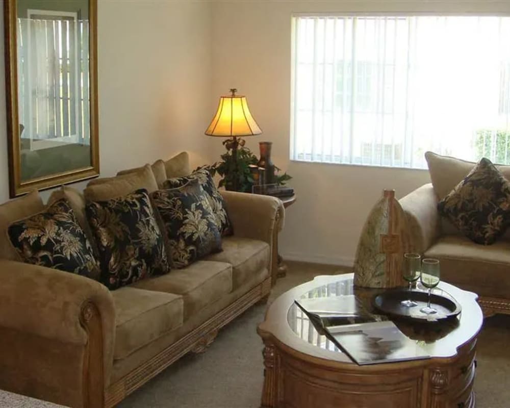 Living room with furniture at Mission Bay in Rockledge, Florida