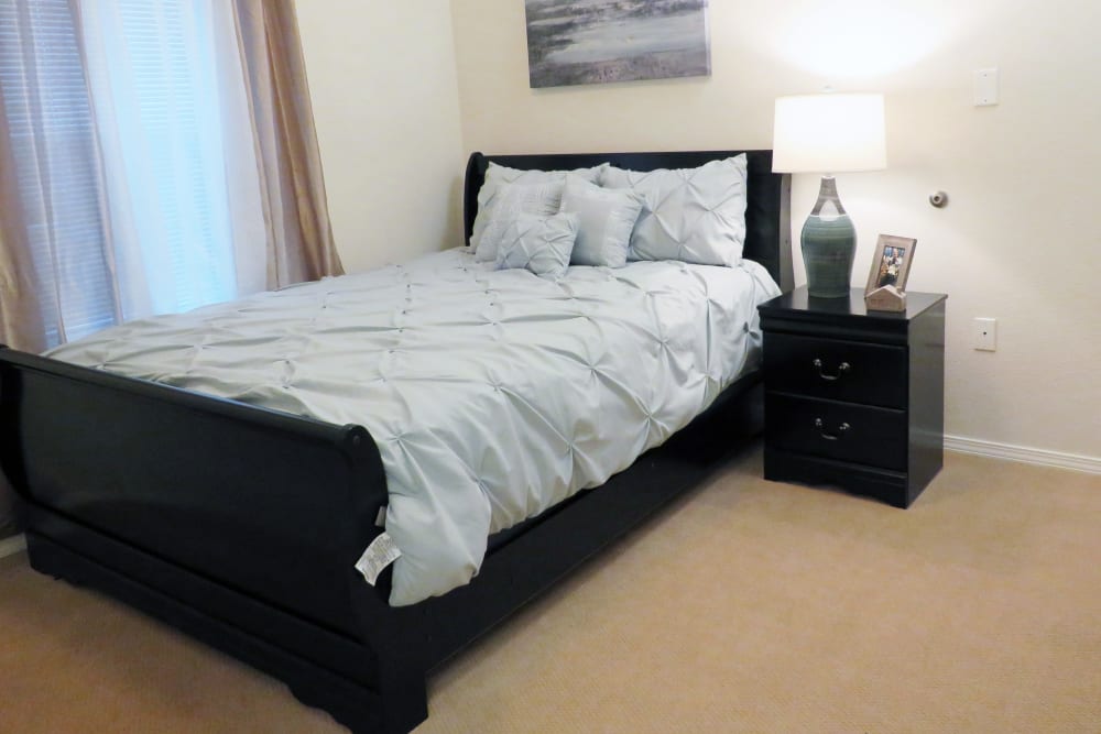 Serene bedroom at Meadowlark Senior Living in Lebanon, Oregon