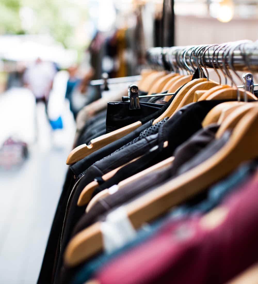 Rack of clothing in a boutique near The Novus Apartments in Durham, North Carolina