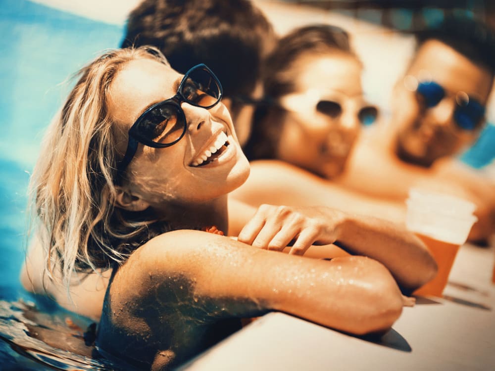 Woman enjoying the pool at TerraLane at Park McDowell in Phoenix, Arizona