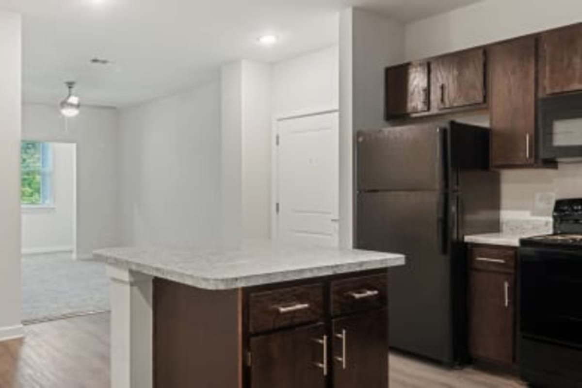 Kitchen with an island at Peachtree Creek on Ponce in Clarkston, Georgia