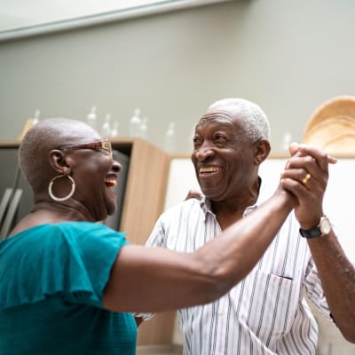 Resident couple dancing at Aurora on France in Edina, Minnesota