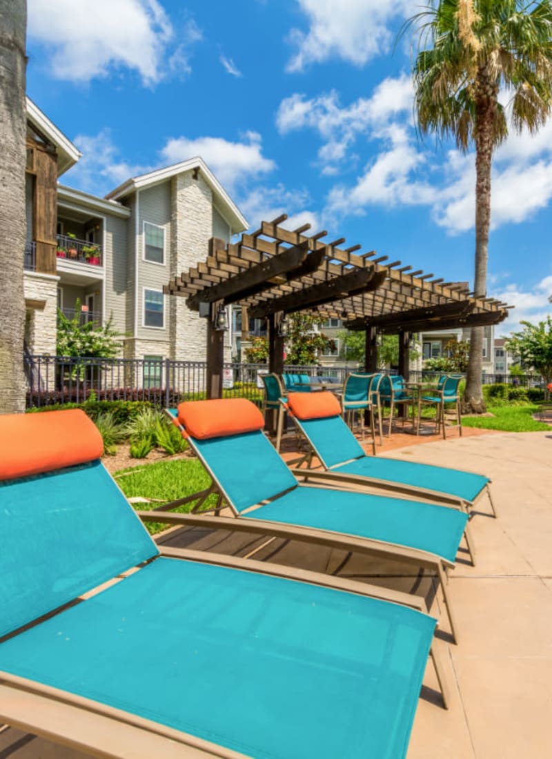 Colorful and bright lounge chairs at Marquis at Sugar Land in Sugar Land, Texas