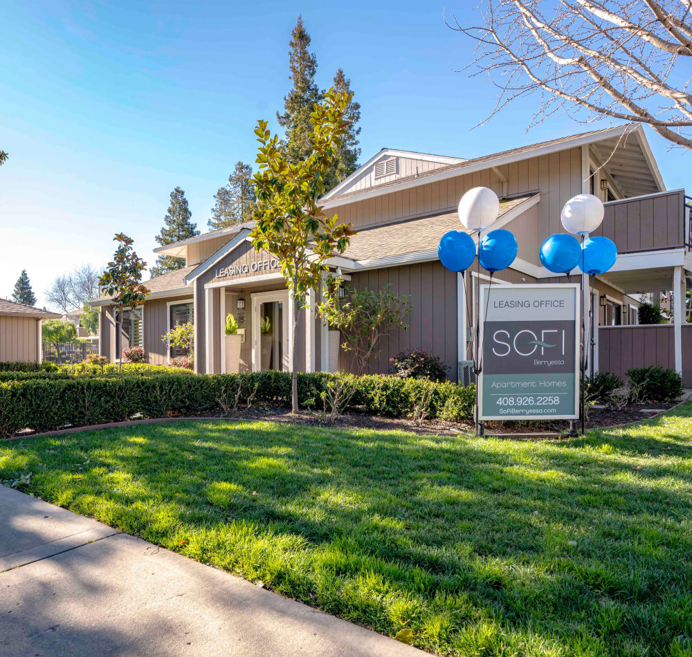 Professionally maintained landscaping outside the leasing center at Sofi Berryessa in San Jose, California