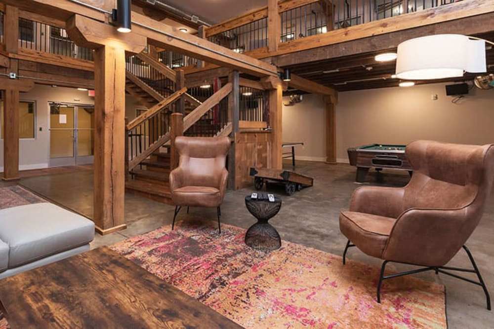 Clubhouse view with stairs to the next level at High Street Lofts in Petersburg, Virginia