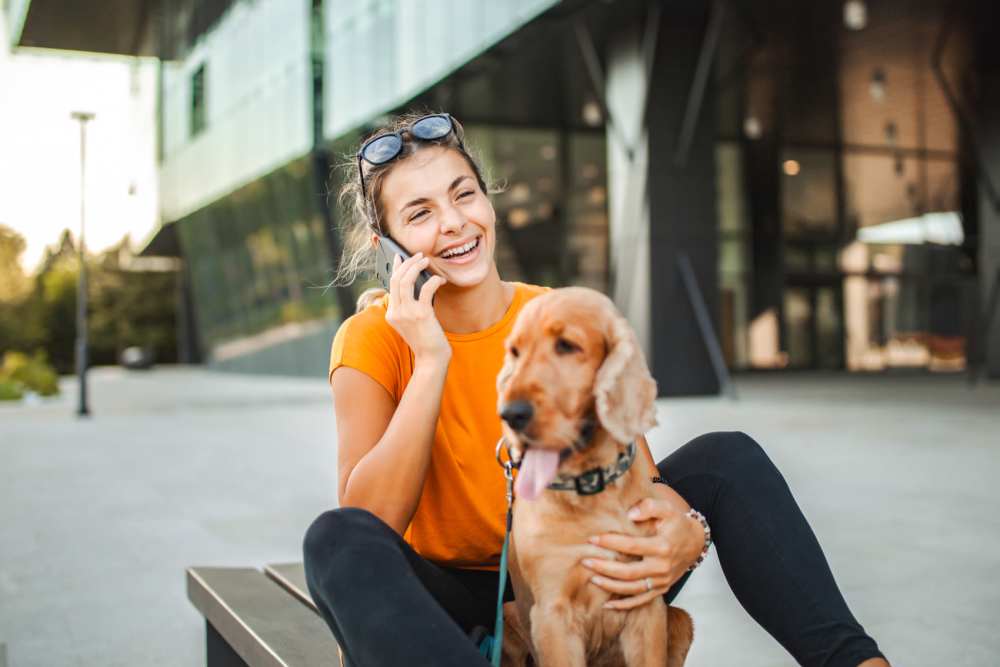 A resident and her dog  at Soba Apartments in Jacksonville, Florida