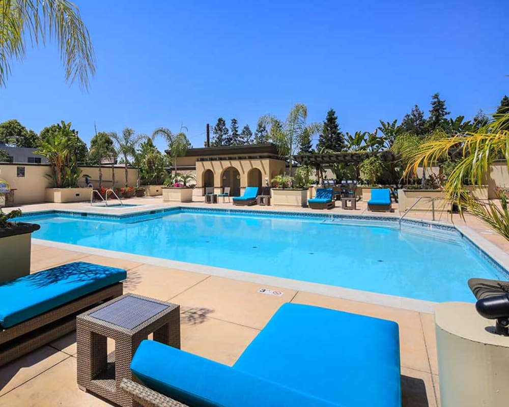 residents swimming in the pool with sunglasses at Livorno Square in San Jose, California