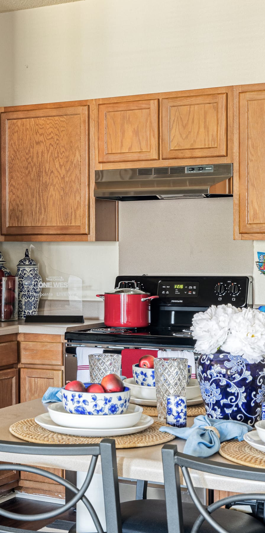 Modern kitchen in a model student apartment at River Pointe in Carrollton, Georgia