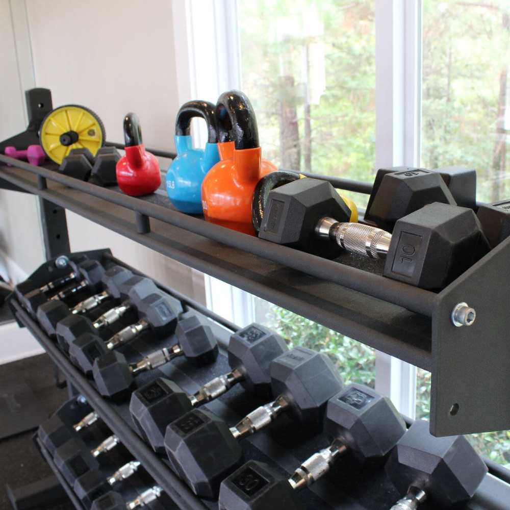 Gym with free weights at Preserve At Columbus Park in Columbus, Georgia