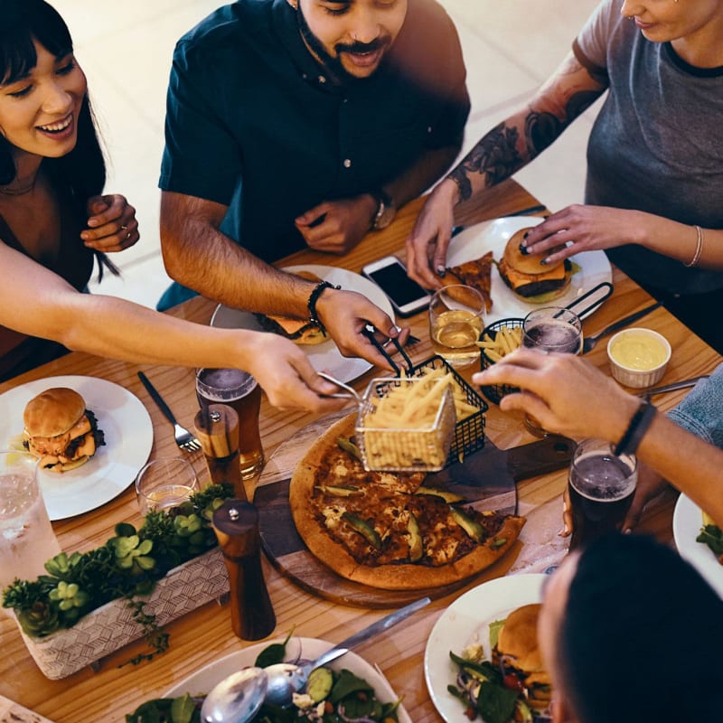 Friends gather for a meal near Pinnacle Apartments, Hampton, Virginia