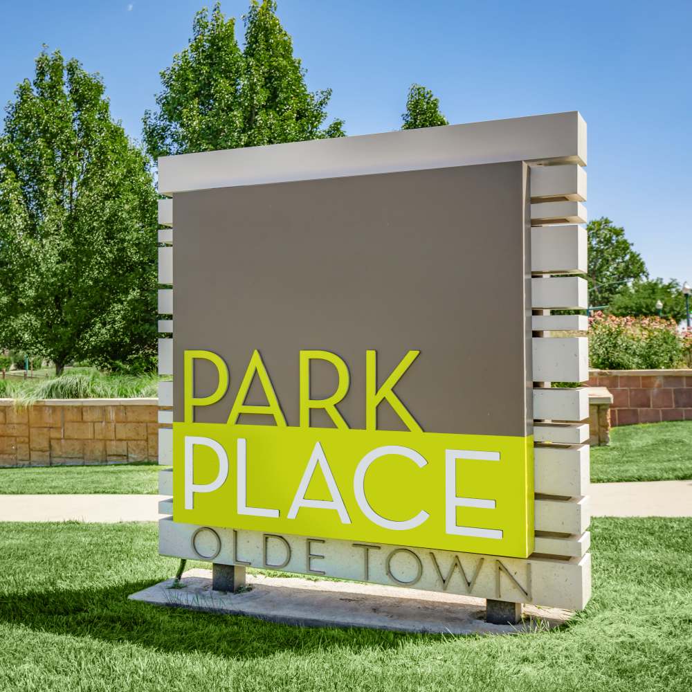 Property signage board at Park Place Olde Town Apartments in Arvada, Colorado