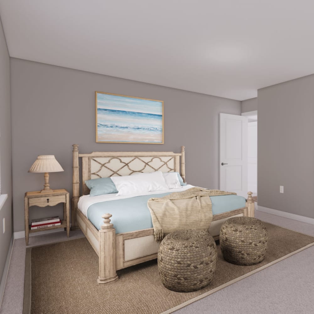 Bedroom with neutral color scheme at The Laurel in Pensacola, Florida