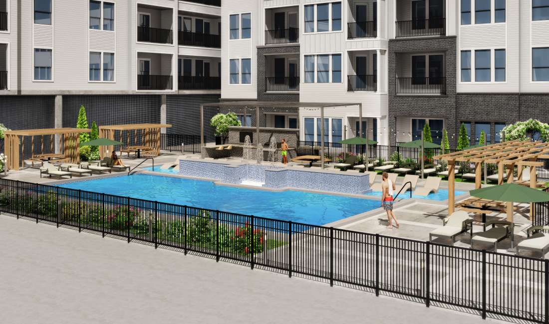 Residents playing in the swimming pool at Seven17 Lehman in Houston, Texas
