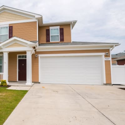 A home with an attached garage at Heroes Manor in Camp Lejeune, North Carolina