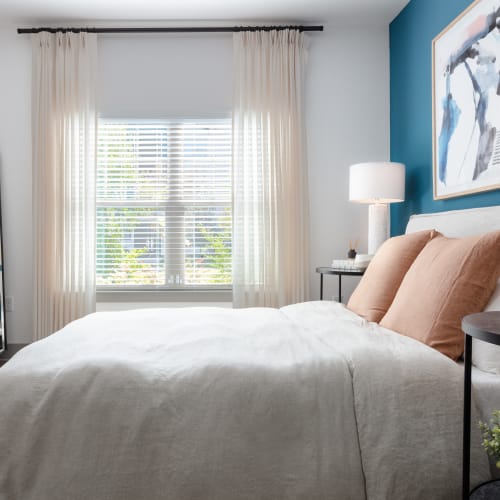 Spacious primary bedroom at Alleia Luxury Apartments in Savannah, Georgia