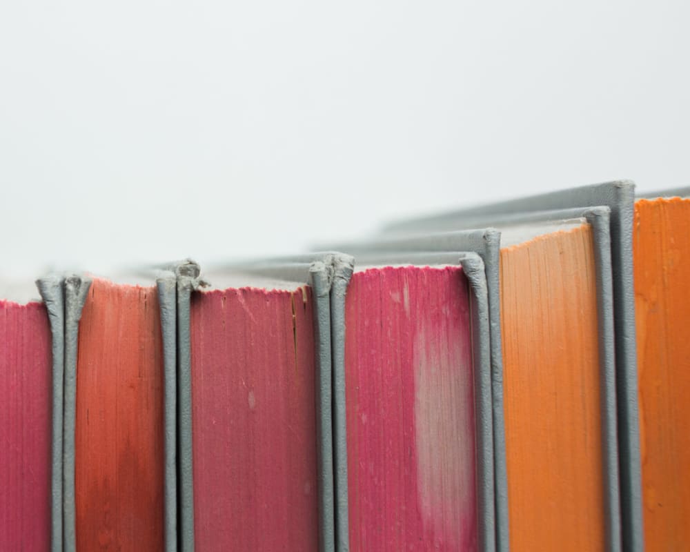 Closeup of a row of schoolbooks at Sofi Belmont Hills in Belmont, California