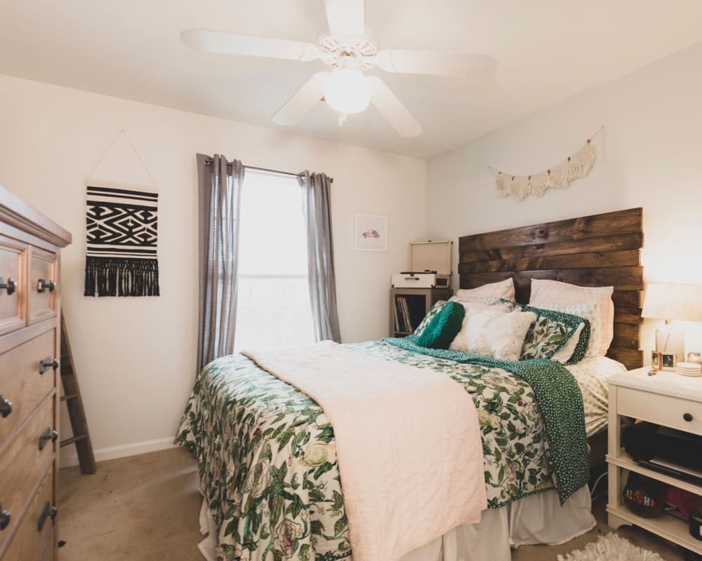 Spacious master bedroom with plush carpeting at Belmont Landing in Farmville, Virginia